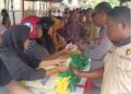 Polda Maluku gandeng Bulog dan Disperindag Maluku gelar pasar murah. (Dok : Humas Polda Maluku)