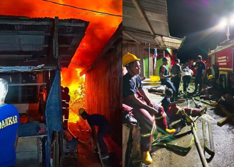 Petugas Damkar SBT bersama masyarakat memadamkan api